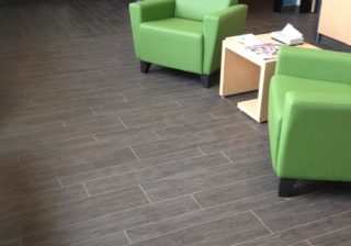 Alpine wood-look porcelain tile flooring in a living room