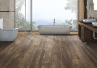 Wood look FloorScore certififed laminate flooring in a luxurious bathroom
