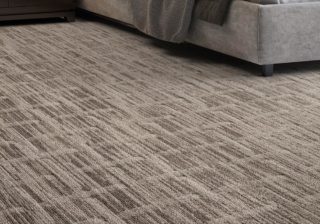 Tan colored Peppy Micorban antibacterial carpet with patterns