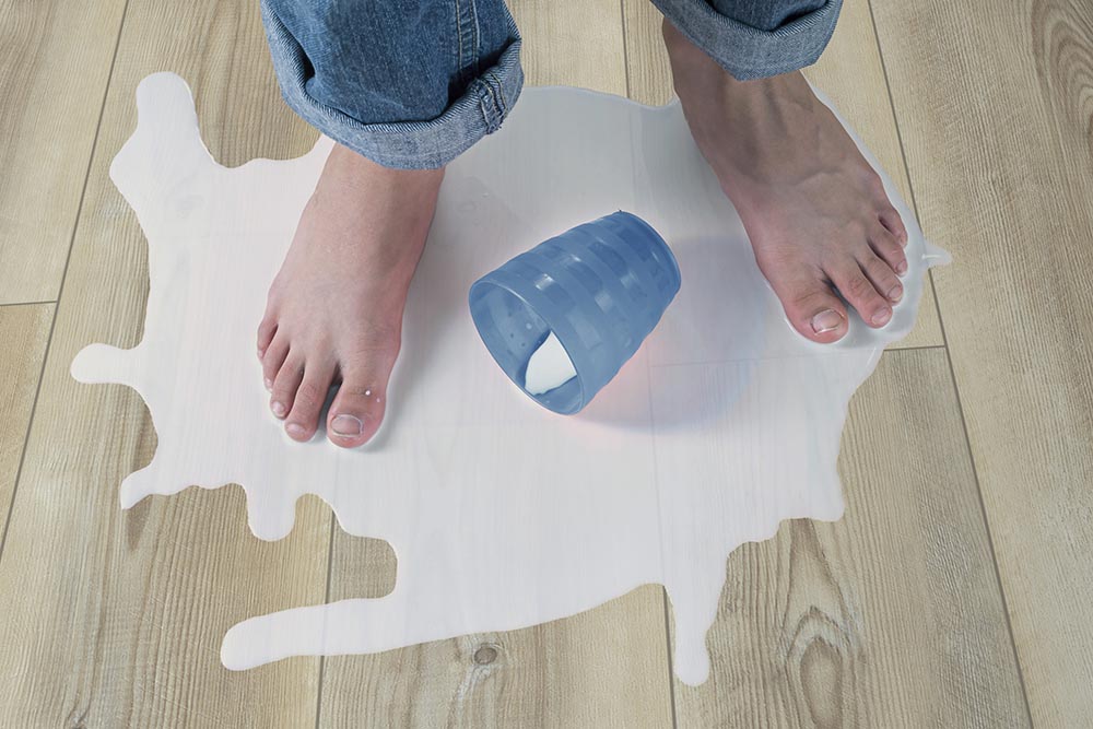 Spilled milk on COLORTILE Pro Waterproof Performance Flooring
