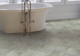 Wilmingsley gray stone-look tile in a bathroom